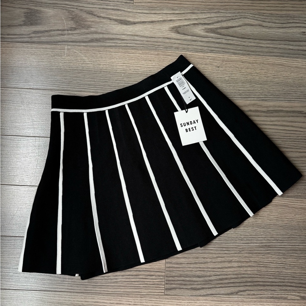 Sold. Aritzia - Sunday Best Pleated Skirt.